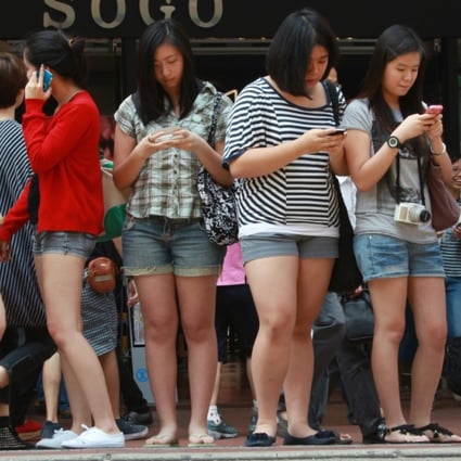Smartphone users in Causeway Bay. Photo: SCMP Pictures