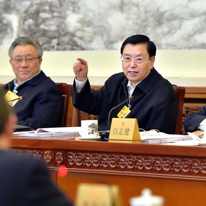 Zhang Dejiang (centre), chairman of the Standing Committee of China's National People's Congress, which will vote on the new draft law. Photo: Xinhua