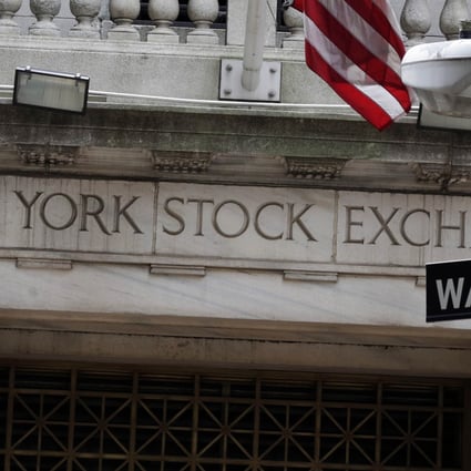 Wall Street in New York where activist hedge funds are sometimes feared or admired. In a study, the funds actually help investor value in a company. Photo: AP