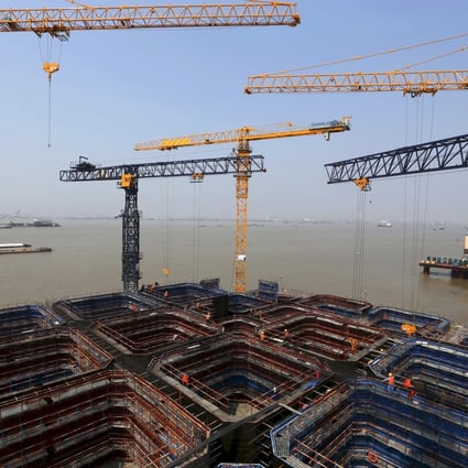 Construction work on a pier and bridge in Nantong in eastern Jiangsu province. The central government is keen to increase investment in infrastructure projects to boost the economy. Photo: Reuters
