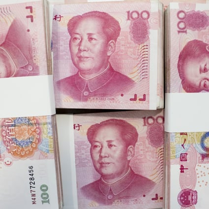 Yuan bank notes are stacked side-by-side in a bank in Hong Kong as yuan forwards hit their strongest level in a week. Photo: Bloomberg