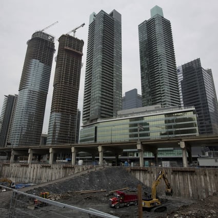 The Canada Mortgage and Housing Corp says the market is perhaps 3 to 4 per cent overvalued, below the 8 per cent considered a problem. Photo: Bloomberg