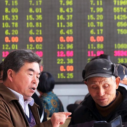 Chinese investors follow the performance of stocks as markets in Shanghai and Hong Kong recovered after Thursday's steep sell-off. Photo: Reuters