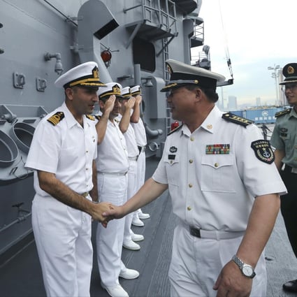 PLA visitors are welcomed aboard the TCG Gediz. Photo: Sam Tsang