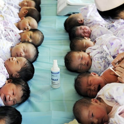 Babies at a maternity hospital in China. Enforcement rules for the one-child policy vary in different provinces and cities. Photo: Reuters