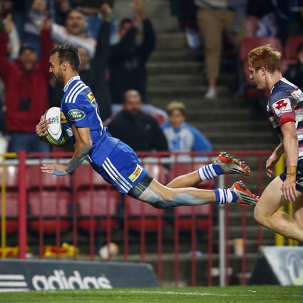 Dillyn Leyds of the Stormers puts a spectacular exclamation point on this try against the Rebels in Cape Town. Photos: EPA