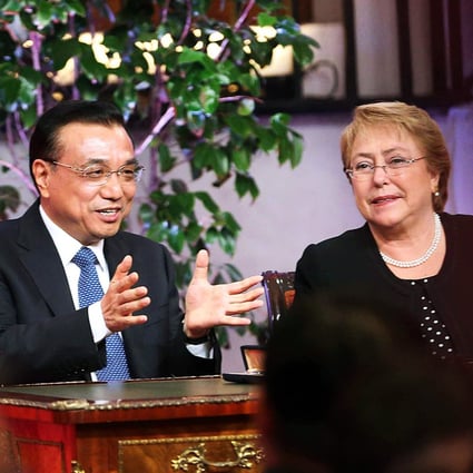 Premier Li Keqiang and Chilean President Michelle Bachelet attend the signing ceremony of bilateral cooperation deals in Santiago, Chile, on Monday. Photo: Xinhua 