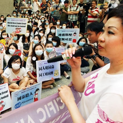 Union chairwoman Dora Lai (right) promises members gathered outside the talks that she will not give up. Photo: Dickson Lee