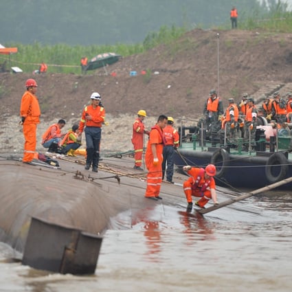 Rescuers are seen on the cruise ship Eastern Star that capsized late on Monday in the Jianli section of the Yangtze River in central China's Hubei Province. Photo: Xinhua
