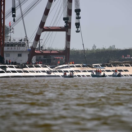 The sunken cruise ship Eastern Star is brought to the surface in the Jianli section of the Yangtze River in Hubei province. Photo: Xinhua 