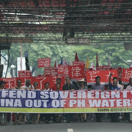 Filipino activists protesting against China's actions in the South China Sea, at a march in Manila last week. Photo: AP