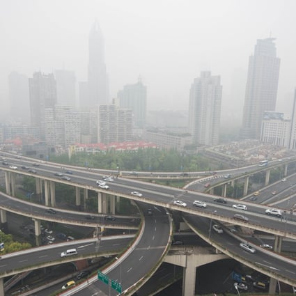 Reduced use of coal in China is helping it to cut greenhouse gas emissions such as carbon dioxide, according to the report. Photo: AFP