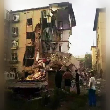 At least 10 people were injured by the blast at a block of flats in Liaoning province early on Friday, which is believed to have been caused when a liquified gas tank exploded. Photo:: SCMP Pictures