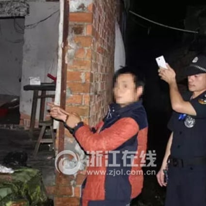 Police pictured with the alleged head of the prostitution ring. Photo: Zjol.com.