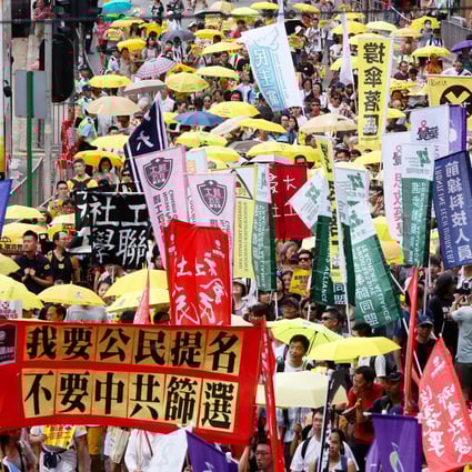 Protesters who are against the reform proposal march to Admiralty. Photo: Sam Tsang