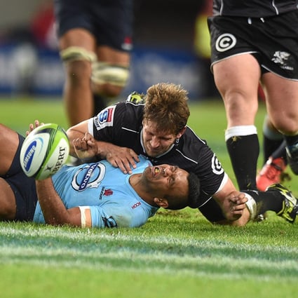 Waratahs utility back Kurtley Beale (bottom), pictured playing against the Sharks, is recovering from a strained quadriceps injury from Saturday's game against the Reds and should be ready for the Super Rugby semi-finals in two weeks. Photo: EPA