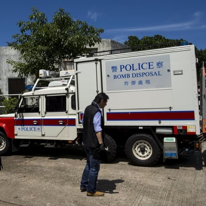 A police bomb disposal vehicle enters the former ATV studio where explosives were seized. Photo: Reuters