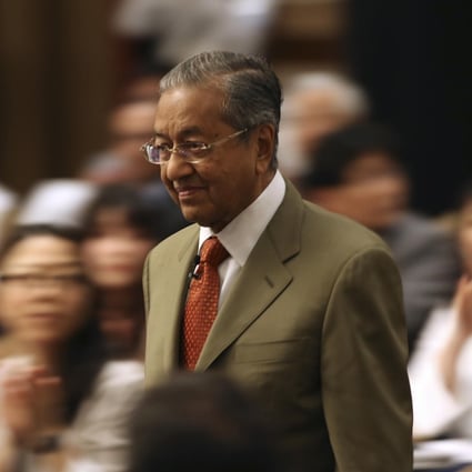 Mahathir Mohamad, at the International Conference on The Future of Asia, in Tokyo, in May. Photos: AP; AFP; Reuters