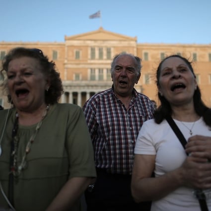 Protesters in Athens take part in a rally against austerity. Photo: EPA