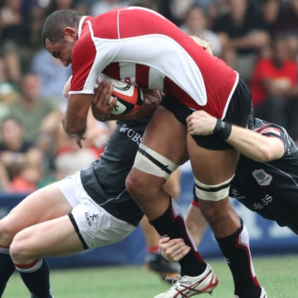 Hong Kong struggle to take down Michael Leitch in the Asian Five Nations. Photo: SCMP
