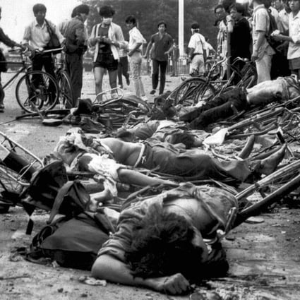 Bodies lie among mangled bicycles near Tiananmen Square in this file photo from the aftermath of the 1989 protests. Twenty-six years after the bloody crackdown in which an unknown number died, the Chinese government's web of silence remains. The precise number of victims is unknown, their names and stories largely untold. Photo: AP