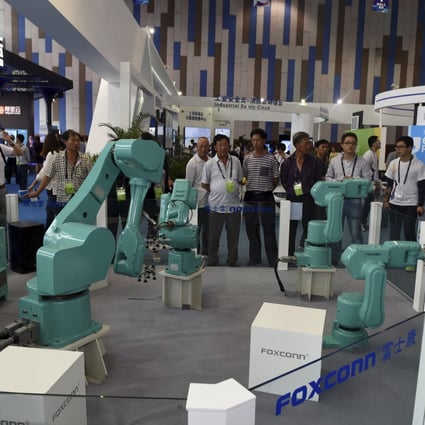 Foxconn wants industrial robots, including its Foxbots, to comprise nearly one-third of its work force within five years. Photo: Reuters
