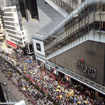Protesters snake through Causeway Bay. Photo: Sam Tsang