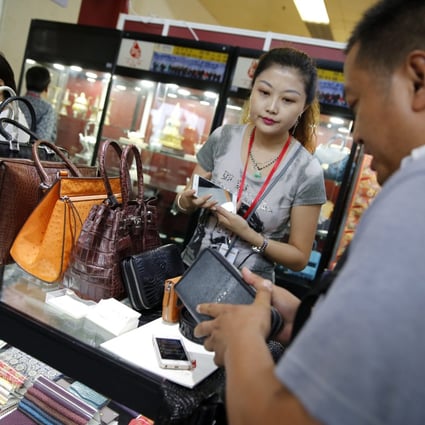 Alibaba's latest investment will give it more of a say in the luxury goods market. Photo: EPA