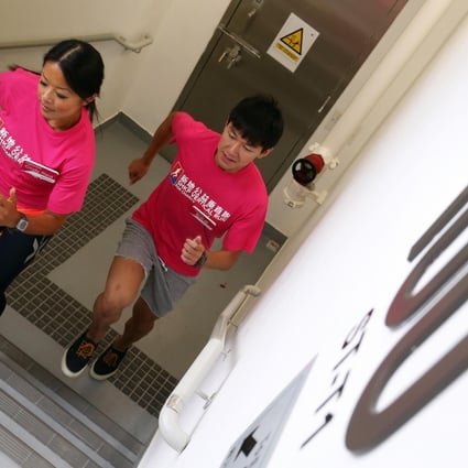 Reigning Sun Hung Kai Properties Vertical Run champion Cindy Reid (left) and fellow runner Lau Tsun-ling hit the stairs at the ICC in West Kowloon yesterday. Photo: Dickson Lee