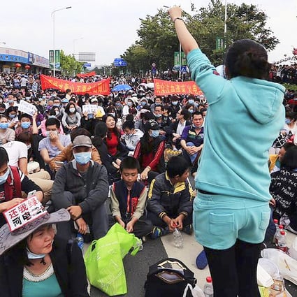 Protesters in Heyuan oppose the planned expansion of the power plant in April. Calm has returned but residents say they are ready to march again. Photo: SCMP Pictures