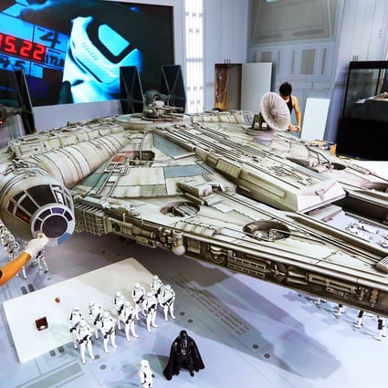 It is 5.5 metres long, 3.7 metres wide and 1.22 metres tall and weighs a tonne – at a scale of 1:6 compared with the spaceship that has appeared in several Star Wars films since the first, in 1977, and will feature again in the upcoming Star Wars: The Force Awakens. Photo: Nora Tam