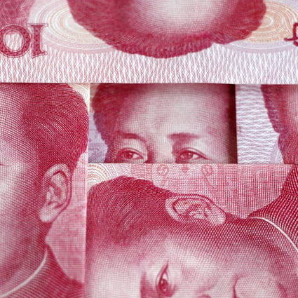 Yuan bank notes are shown as Beijing widened the trading band of the currency without setting a timeframe. Photo: EPA