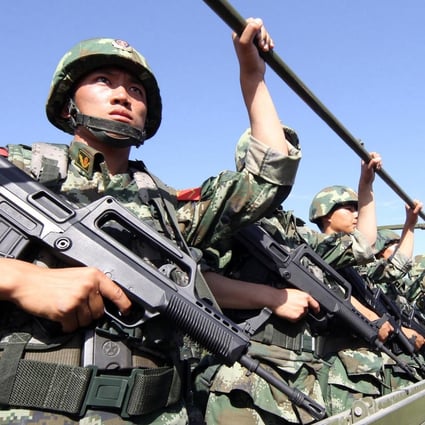 Security forces taking part in an anti-terrorism drill in Xinjiang two years ago. China says Islamist militants from the region pose a threat beyond its borders. Photo: AFP