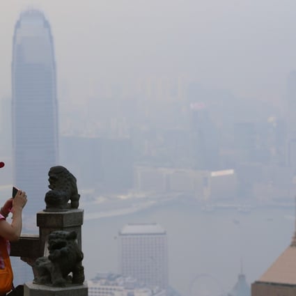 Hong Kong pollution nearly on par with Beijing’s as typhoon’s effect brings hot, windless