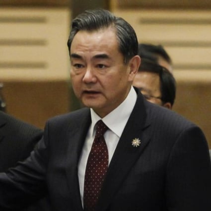 Foreign Minister Wang Yi tells the East Asia Summit on Thursday that Beijing was not impeding freedom of navigation in the contested waterway. Photo: AP 