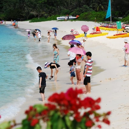 China's State Council wants workers to take Friday afternoons off in the summer so they can make long-weekend trips to popular tourist spots such as Wuzhizhou Island, off the coast of Hainan Province. Photo: Keith Chan