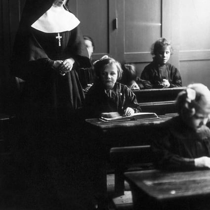A nun takes a class in Germany in the middle of the last century.Photo: Corbis