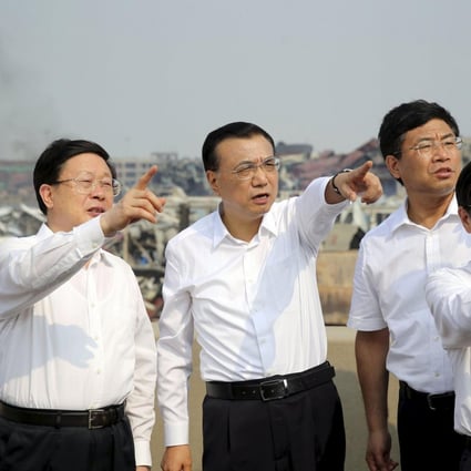 Premier Li Keqiang, second from left, visits the blast site on Sunday. Photo: Reuters