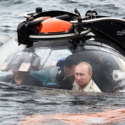 Action-man Putin dons pantsuit to explore Crimea shipwreck in mini-submarine  | South China Morning Post