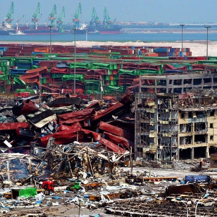 Mangled cargo containers and twisted wreckage at the site of the explosions in Tianjin. Photo: AFP