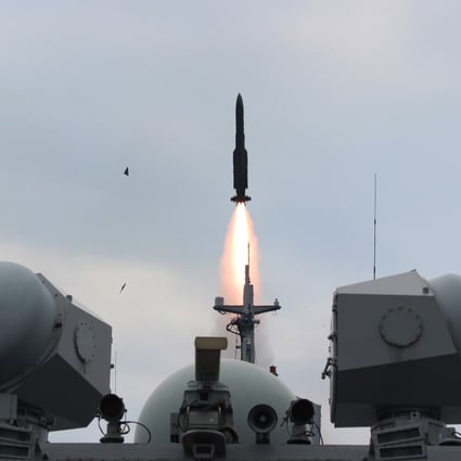 An air defence missile is launched from frigate Changzhou during a drill in the East China Sea. The Chinese navy is extending its reach and was spotted this week in waters off Alaska. Photo: Xinhua