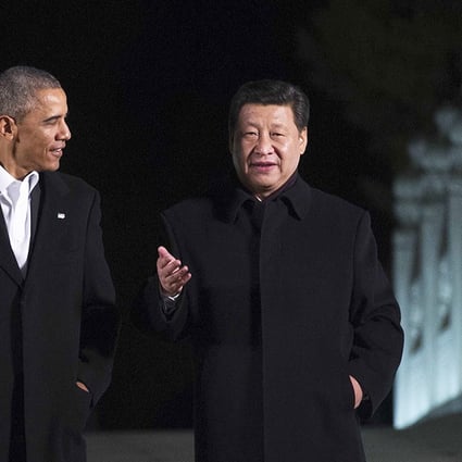 Presidents Barack Obama and Xi Jinping chat in Beijing in 2014. Photo: AFP 