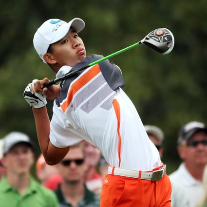 Guan Tianlang tees off during the final round of the 2013 Masters in Augusta. Photo: AFP