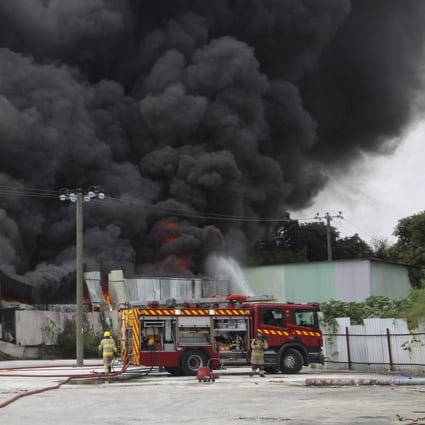 Smoke billows into the air at the recycling plant in Yuen Long. Photo: SCMP Pictures