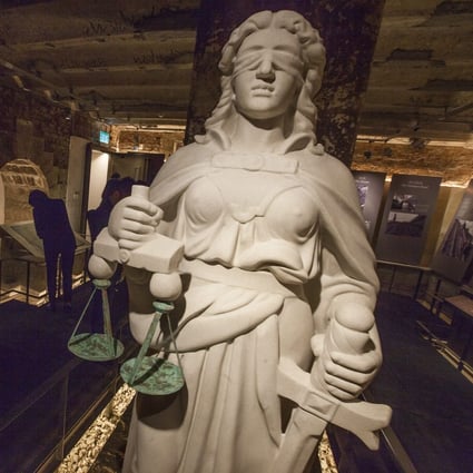 A statue of Themis, the Greek goddess of justice, is seen in the basement of Hong Kong's new Court of Final Appeal building. Photo: EPA