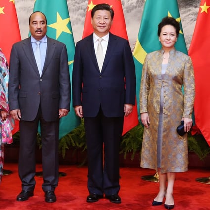 President Xi Jinping and his wife Peng Liyuan greet Mauritanian President Mohamed Ould Abdel Aziz and his wifein Beijing on September 14. Photo: Xinhua