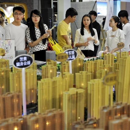 The PBOC's move is aimed at stimulating housing demand and helping destocking of inventories. Photo: Reuters