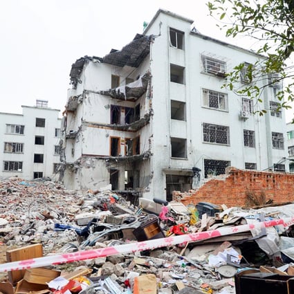 A building lies destroyed in Liucheng county in Guangxi after a series of parcel bomb explosions. Photo: Kyodo 