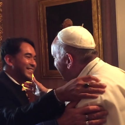 Pope Francis embraces his friend Yayo Grassi, who introduced the head of the Catholic church to his partner. 