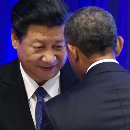 China's President Xi Jinping meets US President Barack Obama in Washington. The two countries have agreed to speed up work on a bilateral investment treaty. Photo: EPA